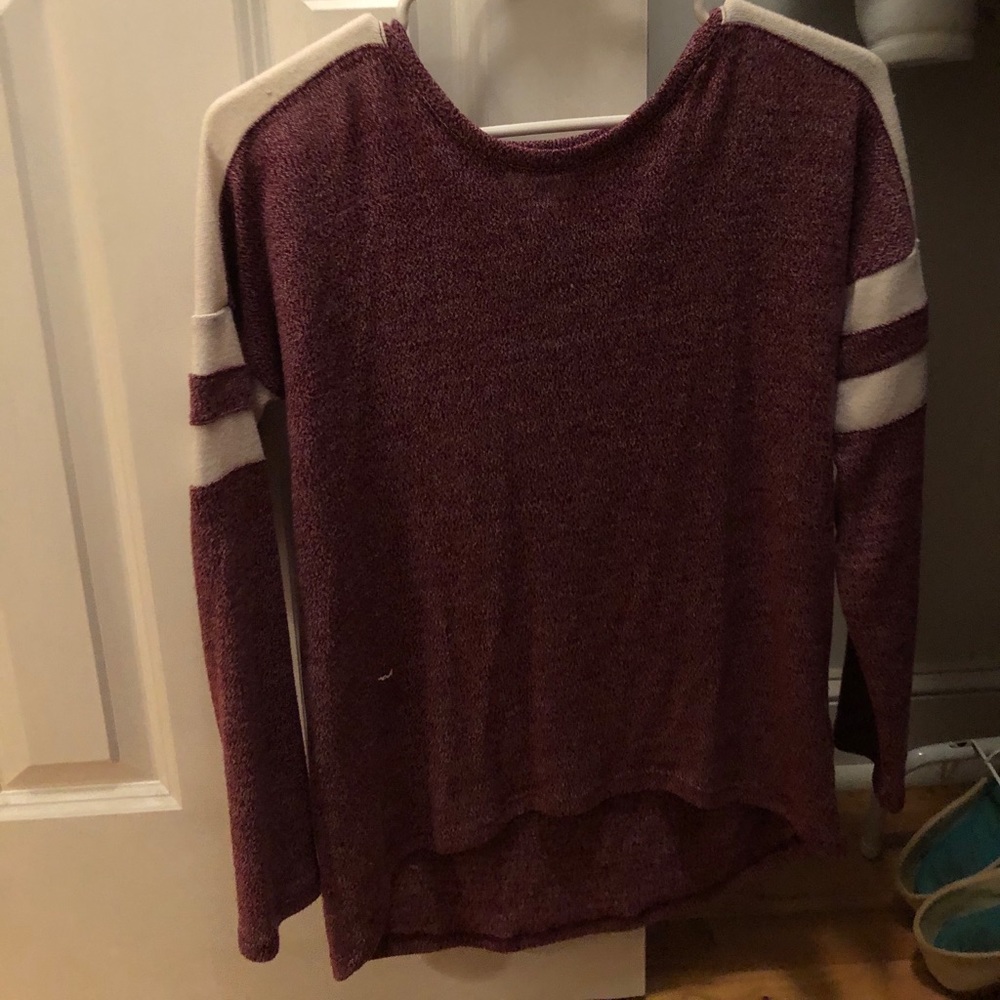 Maroon and cream sweater.